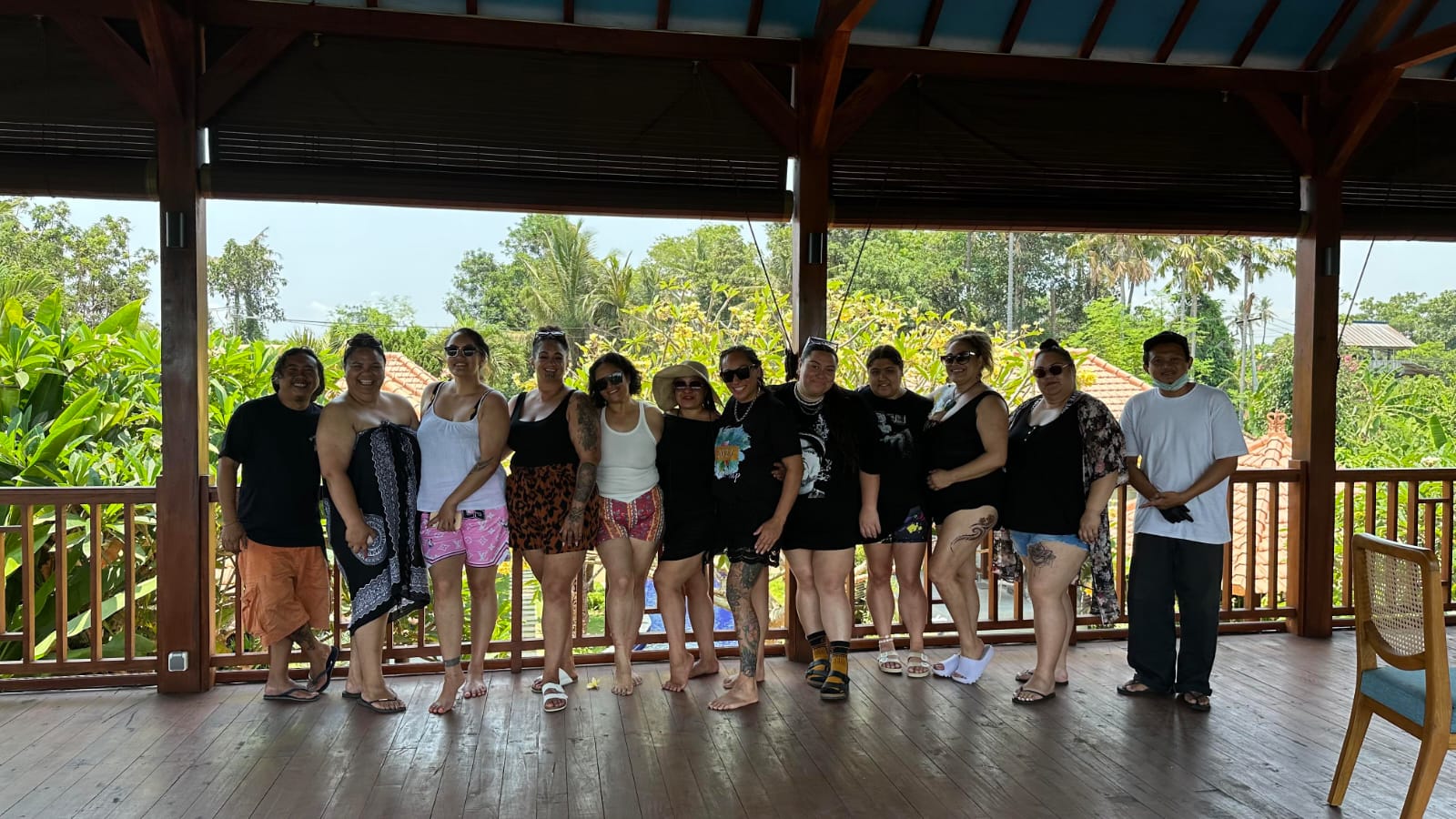 Retreat group on a veranda overlooking Bali